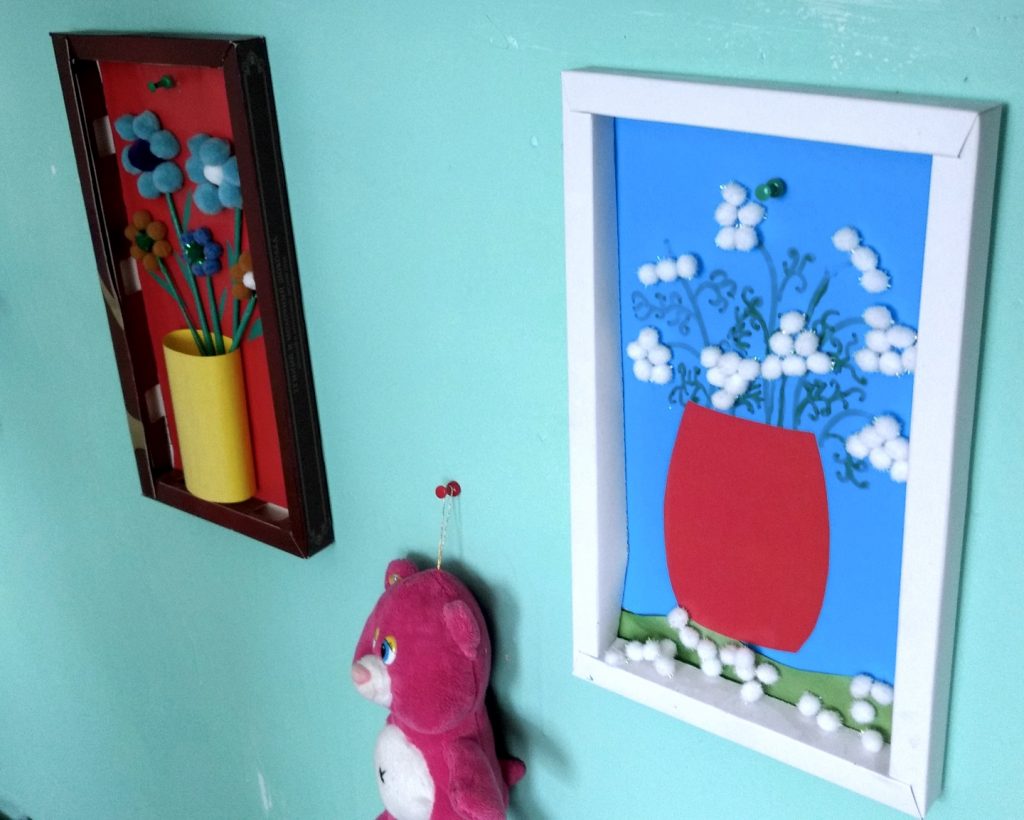 children's paintings made of cotton balls and pipe cleaners
