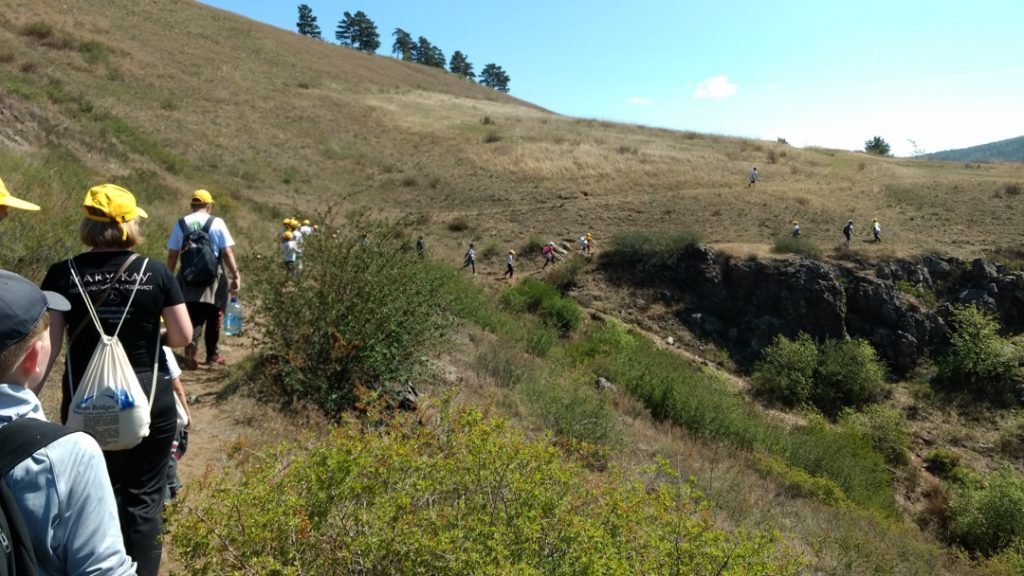 children hiking in the sun