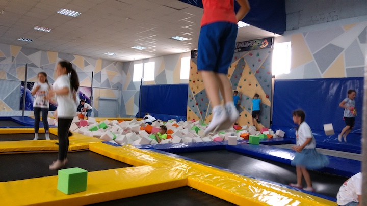 Children at a trampoline center