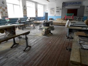 large room with woodworking equipment