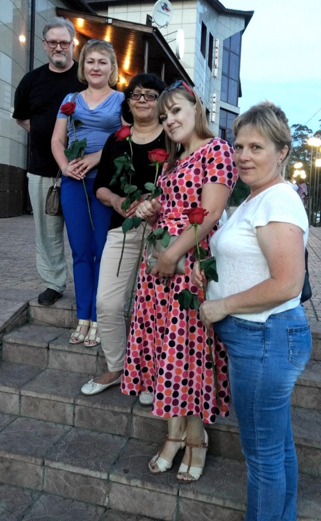 posed photo of friends on a stairs