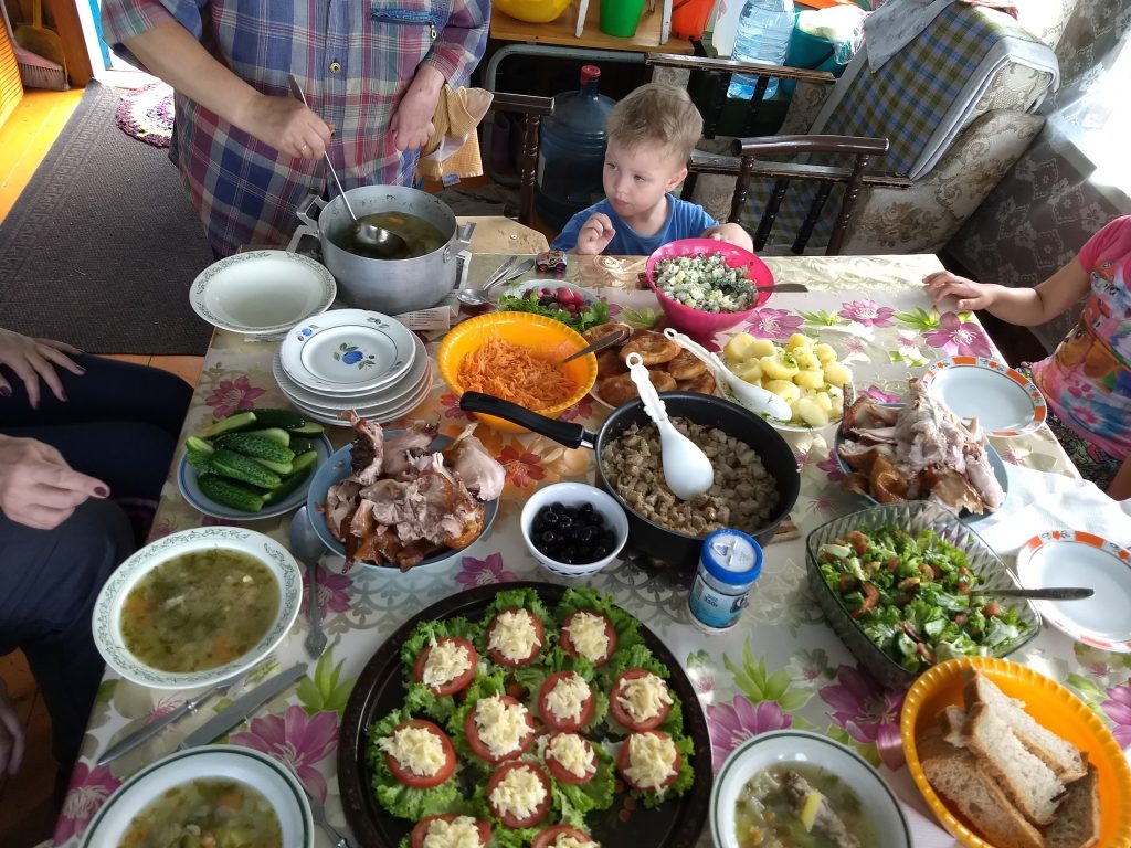 dinner table spread with dishes