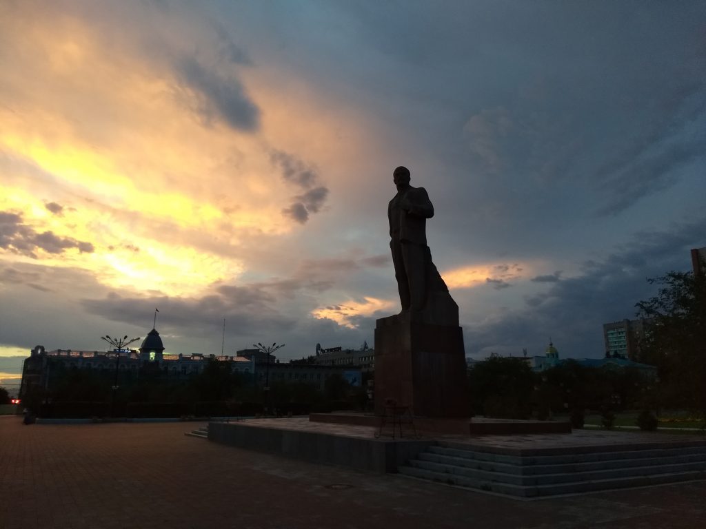 Lenin statue in sunset