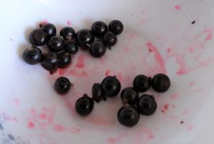 some black berries in a bowl