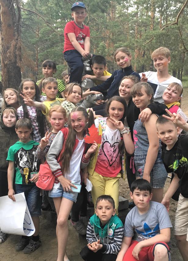 photo of children at camp with Marie